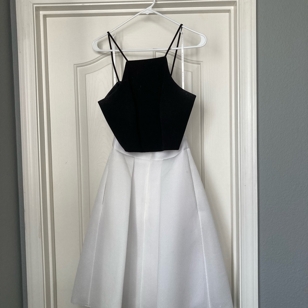 Used black halo crop top and skirt. - Picture 3 of 3